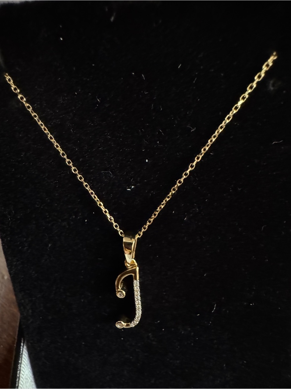 Gold 'J' Initial Pendant Necklace with diamonds.